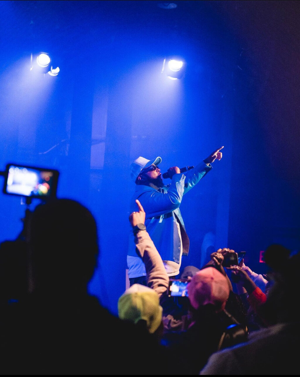 Hip-Hop Artist Cliford Gray performing in front of the crowd