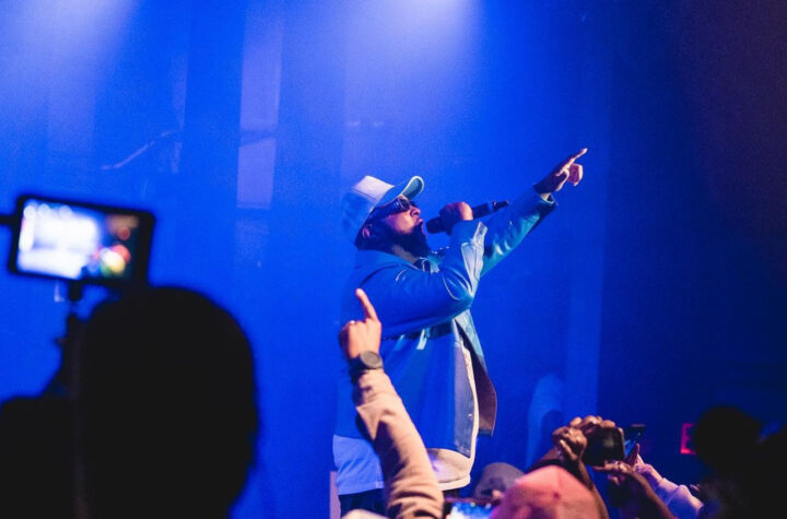 Hip-Hop Artist Cliford Gray performing in front of the crowd